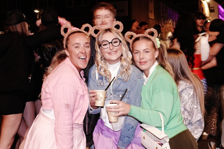 All smiles from these New Year revellers in Torpoint (Pictures: Andy Campfield)