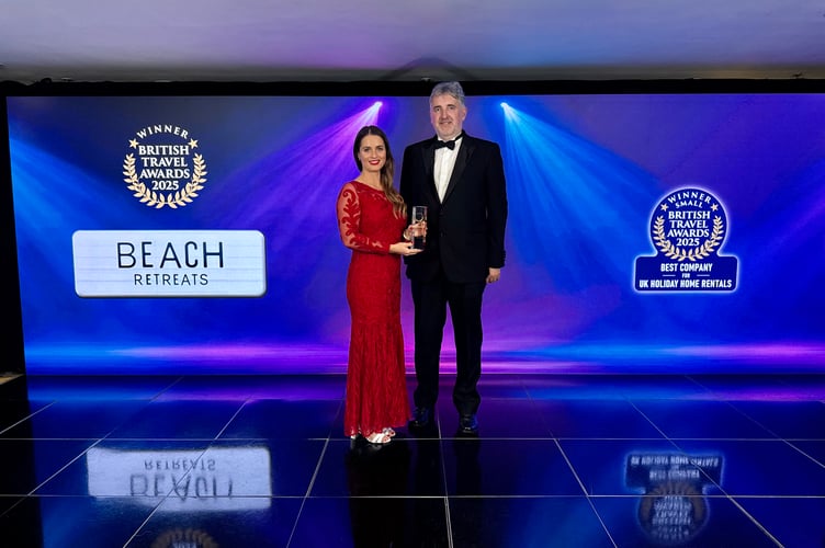 Beach Retreats receiving its award