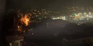 Power lines captured sparking and burning across Cornwall