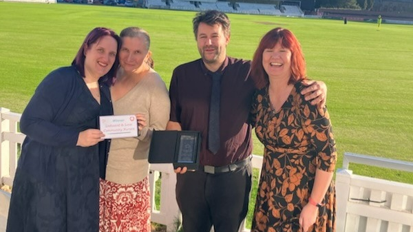 Members of the Liskeard–Looe Community Nursing Team celebrate picking up the Working Collaboratively Towards the Future award