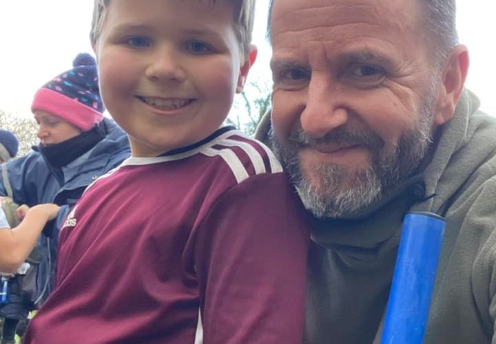 Olly Ashmore and his Dad are all smiles following his performance in the Year 3/4 Boys race