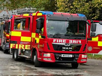 Fire crews tackle car blaze on busy St Austell road
