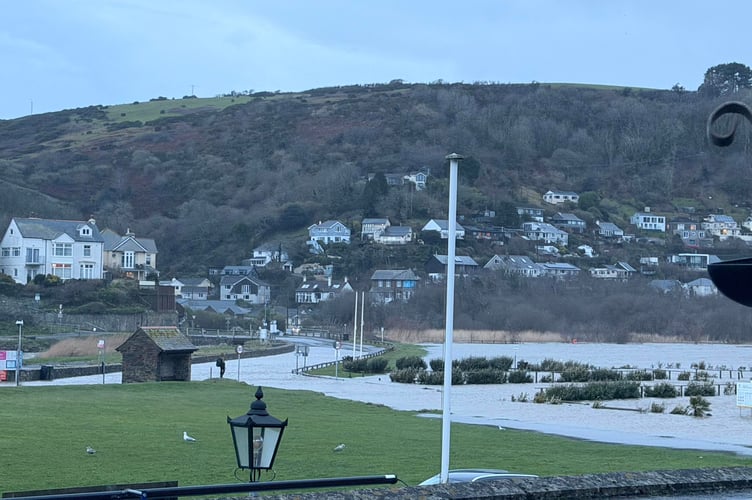 The sea front road at Seaton is deeply flooded and impassable