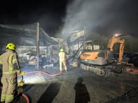 Fire crews tackle large blaze at commercial shed in Roche
