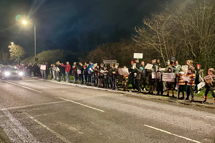 Protestors lined Callington Road to show their objections to plans for an Aldi supermarket to be built at Burraton Park
