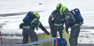 Blue plastic drum washed up on beach sparks response