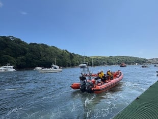 Lifeboat assists occupants of stranded vessel