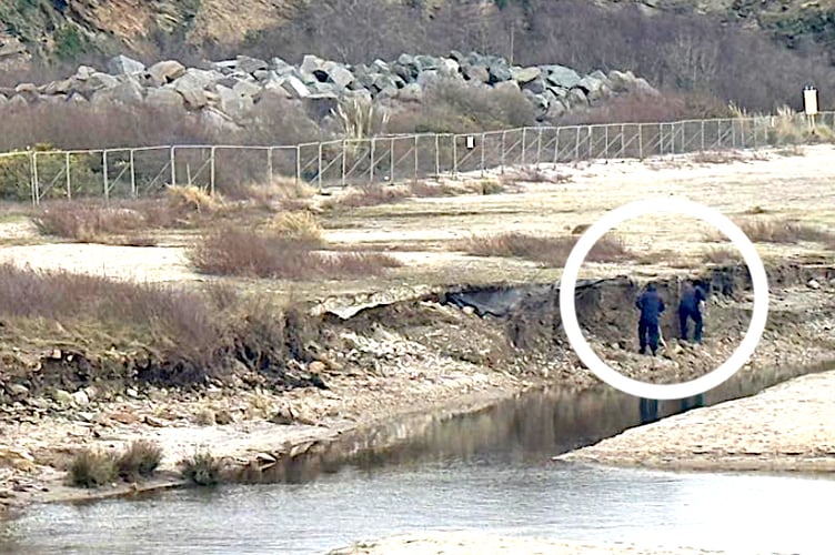 Experts studying the suspect material on the beach at Carlyon Bay. (Picture: St Austell Coastguard)