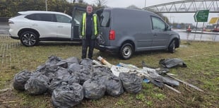 Councillor steps up to clear littered roundabout