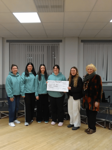 Members of Sister Act alongside trustees Rose Bonner and Sue Hooper