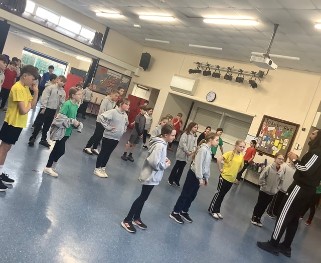 Champion athlete joins pupils for high-energy school challenge