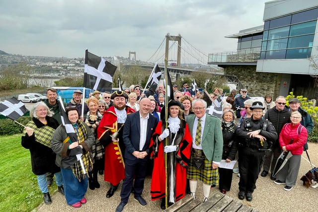 Bridge walk and songs mark St Piran’s Day in Saltash