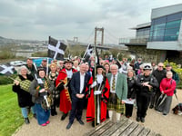 Bridge walk and songs mark St Piran’s Day in Saltash