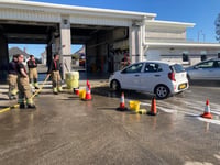 Hoses at the ready as crew host charity car wash