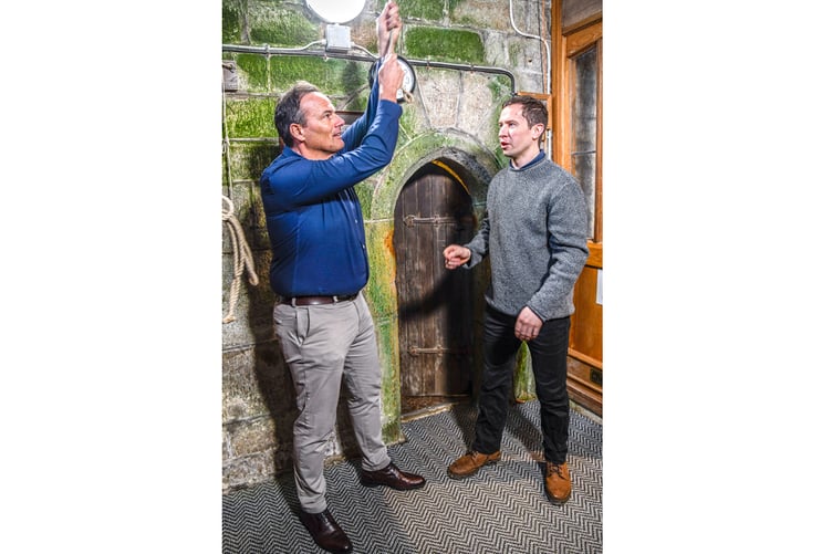 Johnny Cowling has a go at bellringing with Matthew Rodliffe. (Picture: Derek R Williams)