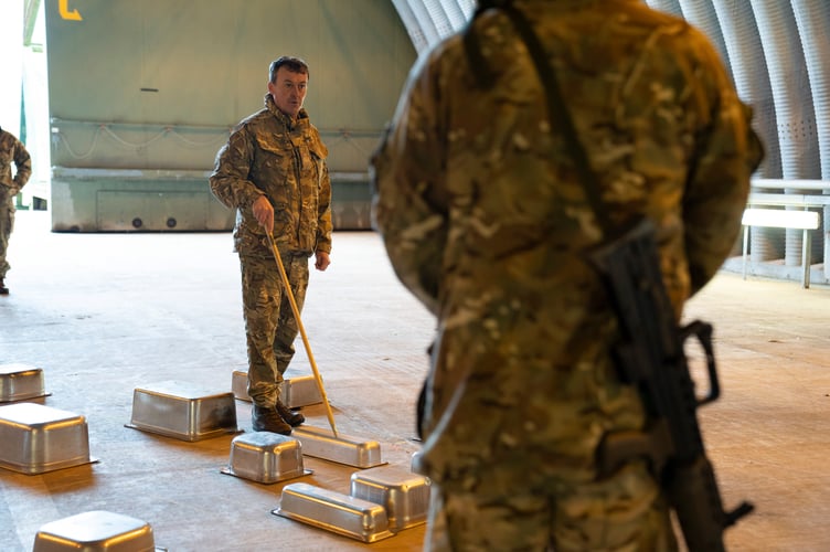 Personnel in hangar (Picture: Cpl  Martin Davis RAF)