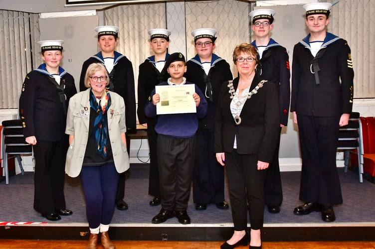 Members of the Rame Head Sea Cadets are presented with their certificate by RBL vice chairman Rosemary Southworth and Torpoint Mayor, Cllr Julie Martin (Pictures: Andy Campfield)
