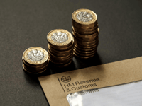 Pound Stability Improves as UK Economic Data Beats Expectations