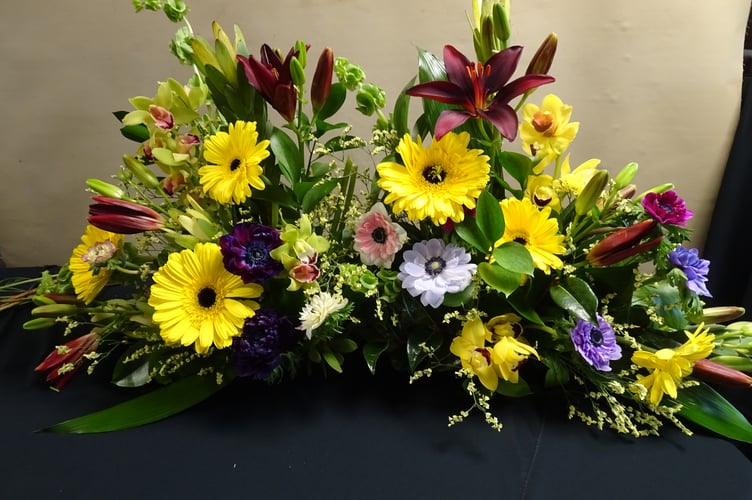 One of the six arrangements created by Karen Smith entitled “Let the Flowers Talk” 