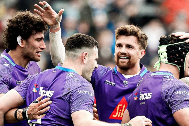 Exeter try-scorer Will Rigg (second left) is congratulated by fellow Chiefs Andrea Zambonin, Henry Slade and Ross Vintcent during their Challenge Cup win against Munster