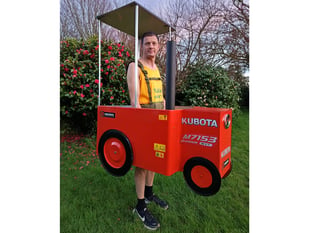 Dairy farmer hoping to break marathon record in a 'tractor costume'