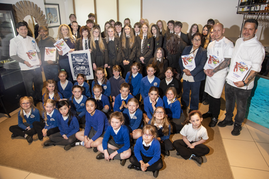 The faces behind the book: Looe’s culinary icons and the next generation of artists celebrate at the Sardine Factory (Picture: CreativeLooe CIC)