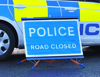 The A382 in Newton Abbot is closed following a police incident