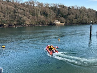Fowey lifeboat team rescue stranded mother and son on Cornish beach
