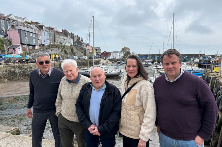 Pictured, from left, are Chris Lobb, Garth Shephard, parish chair Mike Roberts, Dr Barbara Dunn and Cornwall councillor James Mustoe (Pic: Lee Trewhela / LDRS).