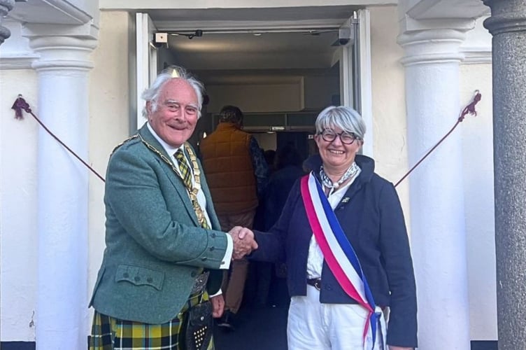 Mayor of Saltash, Cllr Brian Stoyel, welcomes First Deputy Mayor of Plougastel, Patricia Henaff to the Cornish town
