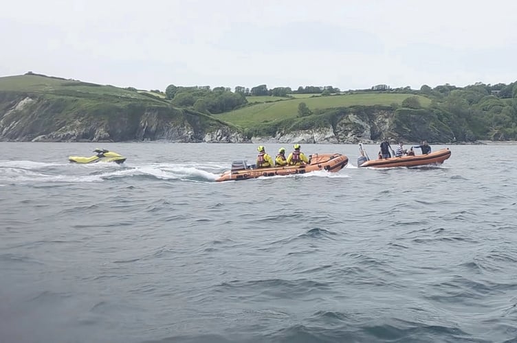 The rescued men were escorted to safety by the Fowey inshore lifeboat. (Picture: Fowey RNLI)