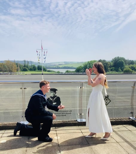 HMS Raleigh recruit Cameron Mitchell brought a carefully planned surprise to life when he got down on one knee and proposed to Lexi-Jane Wanley at the Royal Navy training establishment in Torpoint (Picture: HMS Raleigh)