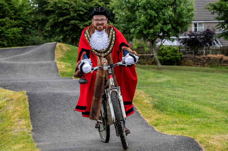 The new mayor of St Austell, Cllr Ethan Stephens, riding a bicycle on the new pump track. (Picture: St Austell Town Council/Paul Williams)