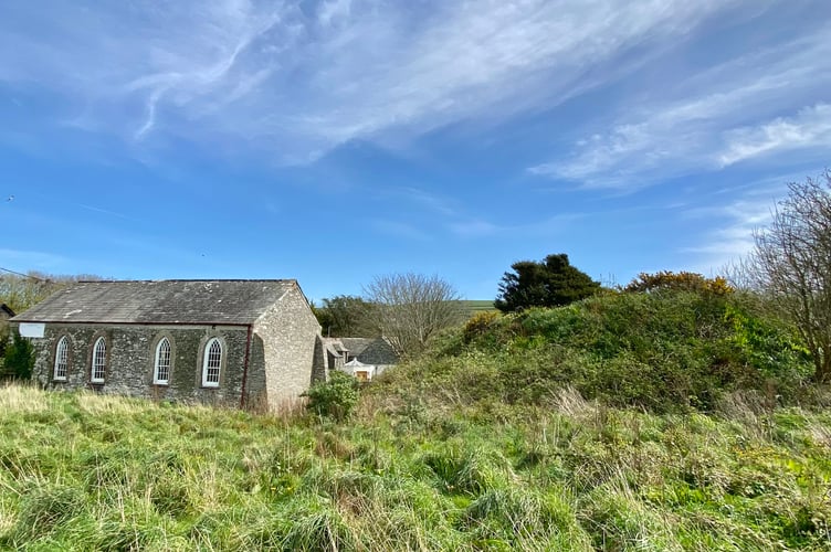 The Bossiney Mound stands beside a chapel building in the North Cornwall village of Bossiney. (Picture: Andrew Townsend)
