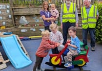Volunteers restore rocking motorbike for Looe Preschool