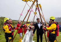 Lifeboat crew surprise newlyweds with special guard of honour