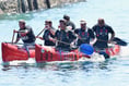 Over £2,600 raised for Looe RNLI after raft racers take the plunge