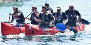 Over £2,600 raised for Looe RNLI after raft racers take the plunge