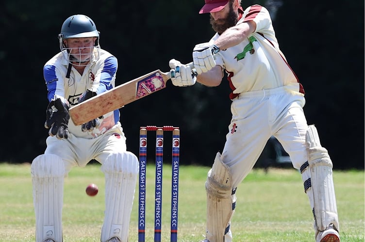 Duloe batsman Aaron Conway plays a shot under the watchful eye of Saltash wicket-keeper Justin Hemmings.
