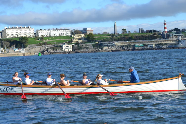 Inaugural rowing event takes to the water.