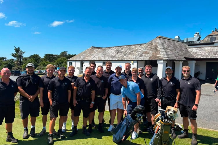 The grounds team at St Enodoc get to have a picture with Rory McIlroy and Shane Lowry