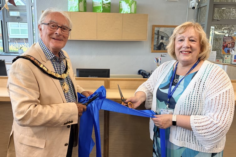 Saltash mayor, Cllr Brian Stoyel alongside deputy mayor, Cllr Brenda Samuels, officially reopen the town's library