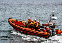 RNLI crew launch after paddleboard emergency off Seaton