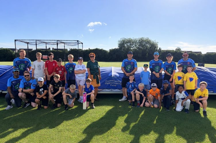 Members of Saltash Cricket Club's youth section alongside Sarah Perkins, SW Community Co-Ordinator from Samworth Brothers, who have provided vital funding to boost their youth programme
