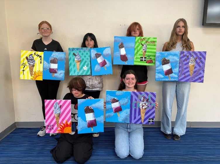Art students Willow , Luka , Bronte, Bea, Hannah and Poppy from Looe Community Academy proudly show off their work