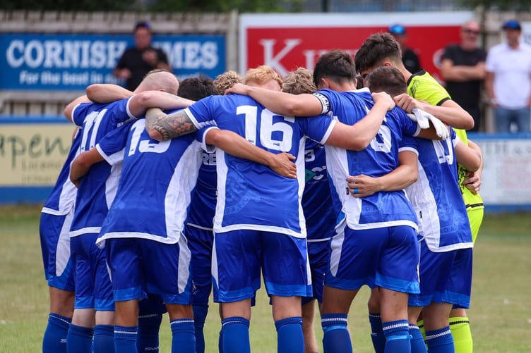 Liskeard Athletic first team huddle.