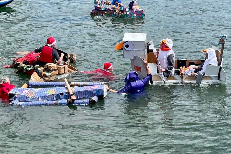 Sunday's ever-popular cardboard boat race saw teams take to the River Tamar in front of huge crowds