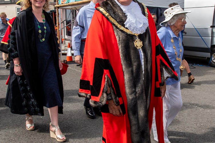 Mayor of Saltash, Cllr Brian Stoyel leads the traditional parade on Day One of the Regatta