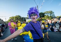 Cheering crowds gather to enjoy Charlestown's colourful carnival parade