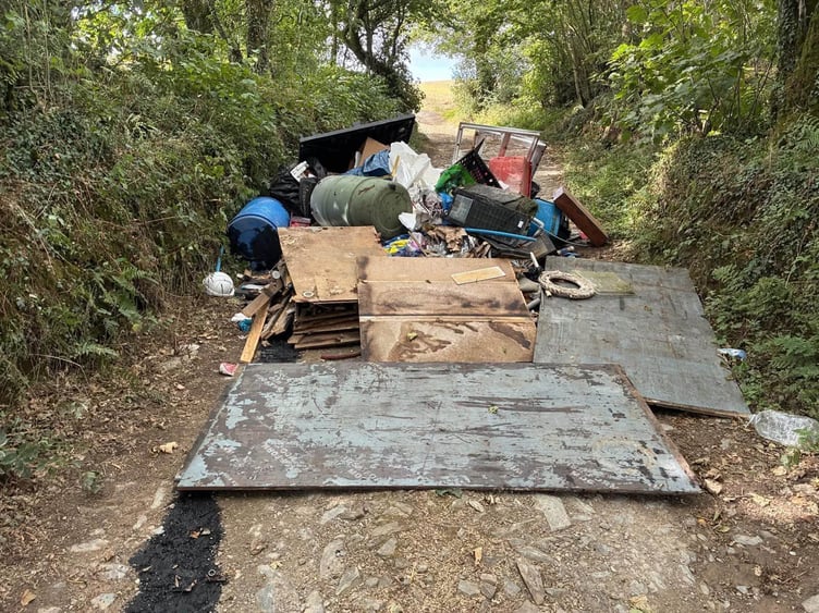 Large amounts of waste have been dumped on Treffry Road between Lanhydrock Roundabout and Innis Downs